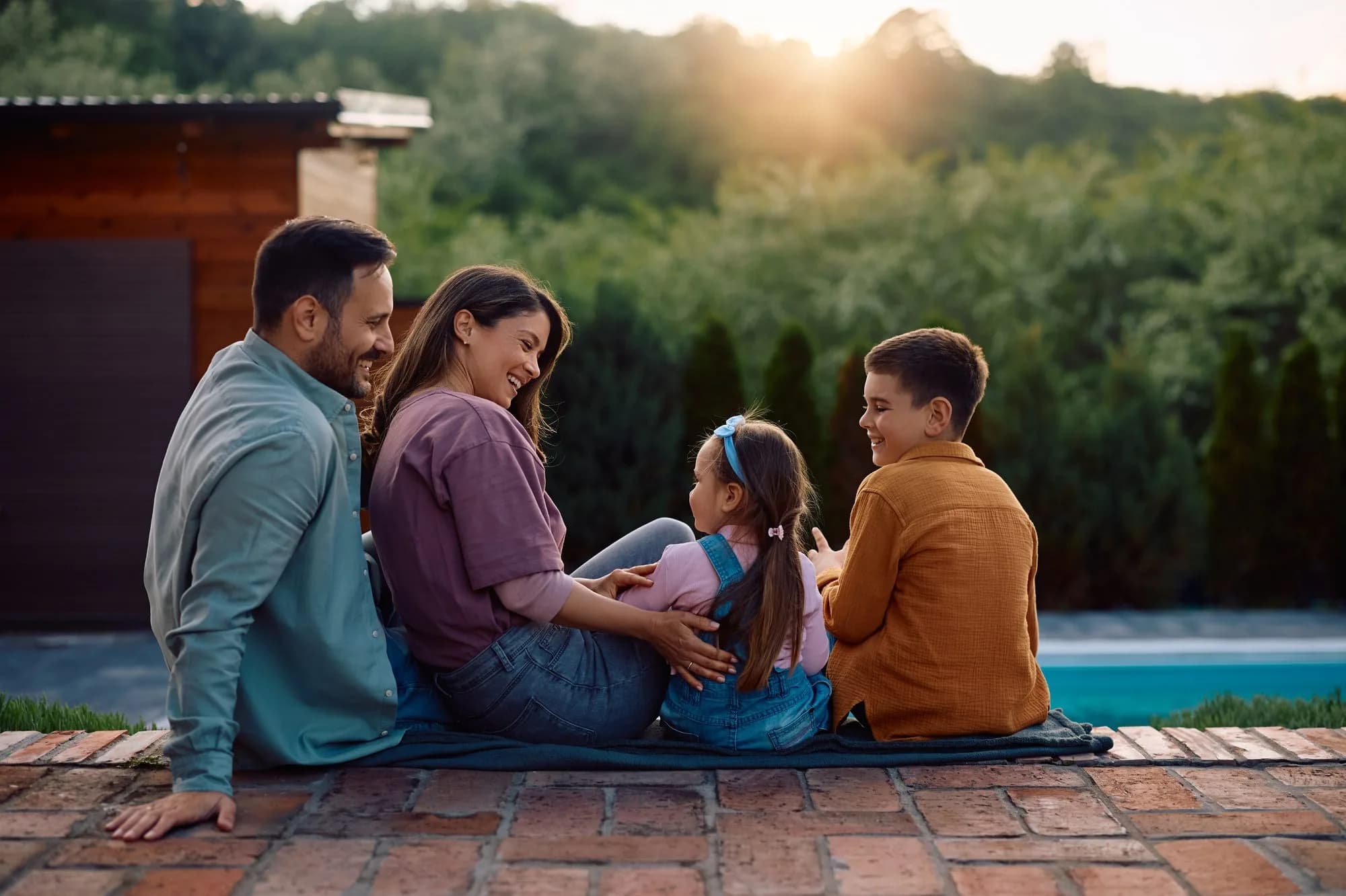 Family spending time outdoors on a spacious residential property
